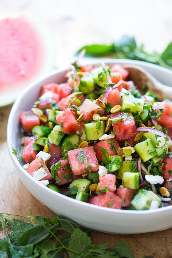 Our favorite Watermelon Salad with Cucumber, pistachios, parsley, mint, onion and crumbled feta (optional) ...refreshing, simple and delicious! GF and Vegan adaptable.