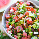Moroccan Watermelon Salad with Cucumber, pistachios, parsley, mint, onion and crumbled feta...refreshing, simple and delicious! | www.feastingathome.com #watermelon #watermelonsalad #watermelonfetasalad #watermelonrecipes