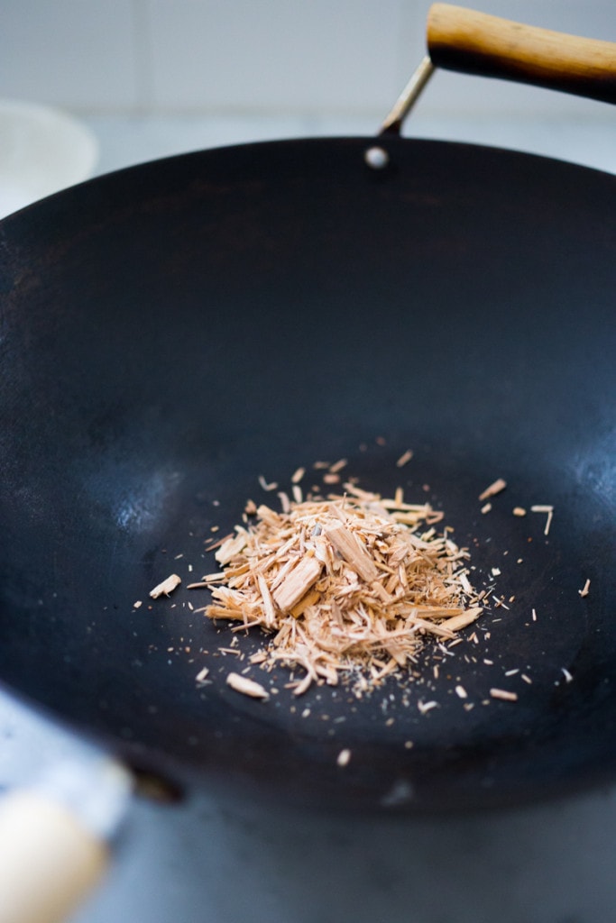 An easy recipe for simple smoked chicken, to use in tacos, enchiladas, lasagna or tossed in pasta. Can be smoked in a wok on the stove! |www.feastingathome.com