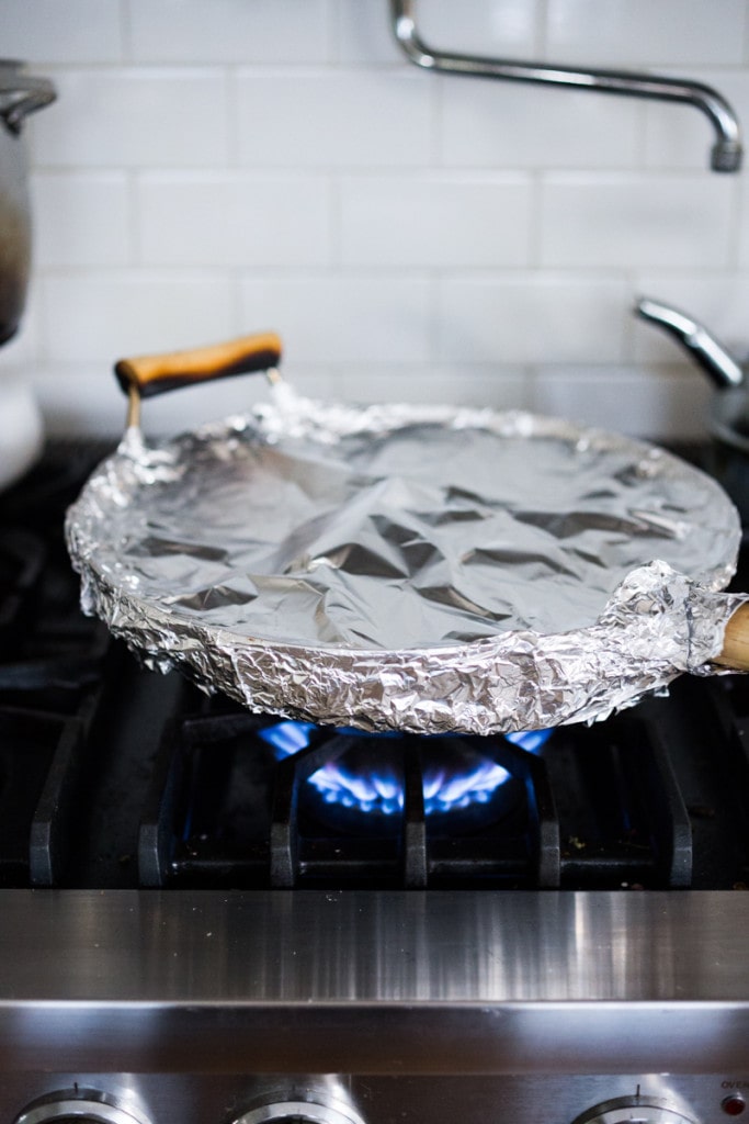 An easy recipe for simple smoked chicken, to use in tacos, enchiladas, lasagna or tossed in pasta. Can be smoked in a wok on the stove! |www.feastingathome.com