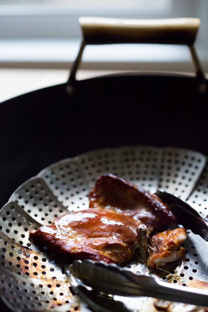 An easy recipe for simple smoked chicken, to use in tacos, enchiladas, lasagna or tossed in pasta. Can be smoked in a wok on the stove! |www.feastingathome.com