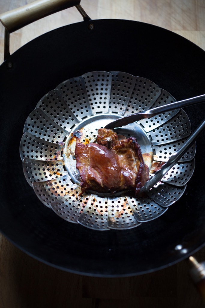 An easy recipe for simple smoked chicken, to use in tacos, enchiladas, lasagna or tossed in pasta. Can be smoked in a wok on the stove! |www.feastingathome.com