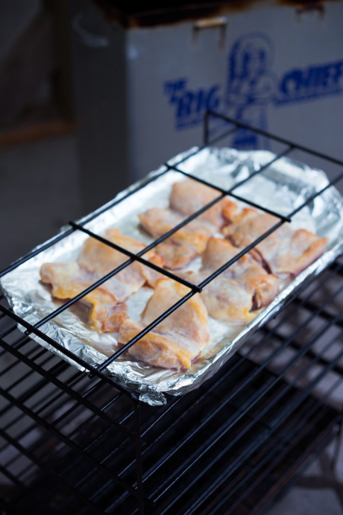 An easy recipe for simple smoked chicken, to use in tacos, enchiladas, lasagna or tossed in pasta. Can be smoked in a wok on the stove! |www.feastingathome.com