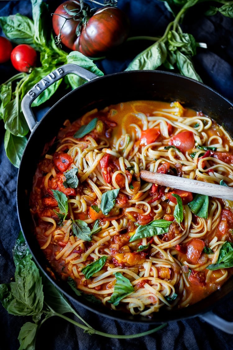 Spaghetti with Fresh Tomato Sauce and Basil in a saute pan.