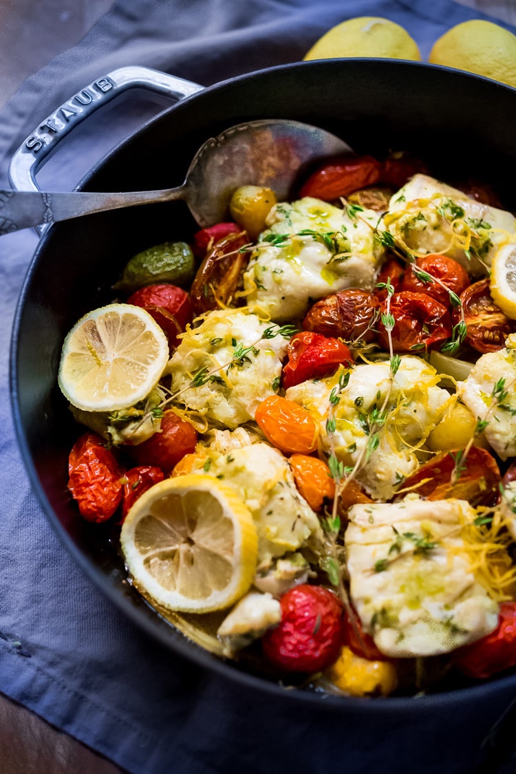 Baked Haddock with roasted tomatoes, fennel and shallots- a simple, easy, healthy one pot meal that can be made in 35 minutes! Gluten-free, Paleo, keto. #haddock #bakedhaddock 