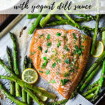 Oven Baked Salmon with Asparagus and Yogurt Dill Sauce - an EASY healthy, sheet-pan dinner that comes together in under 30 minutes. #salmon #roastedsalmon #bakedsalmon #aspargus #dinner #sheetpandinner #easyrecipes #healthy #keto #lowcarb