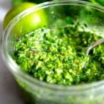 Authentic Chimichurri Sauce- a simple Argentinean condiment or marinade made with cilantro to spice up grilled steak, tacos, shrimp, chicken, or vegetables!