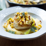 A delicious recipe for seared Halibut, featuring fresh summer corn, leeks, sage and optional pancetta served over creamy polenta.