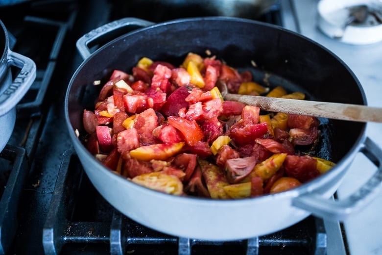 tomatoes cooking in a pan