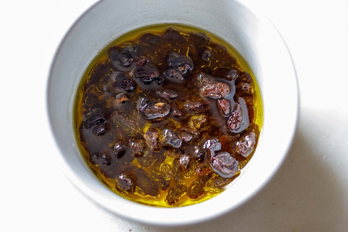 turmeric dressing with raisins soaking.