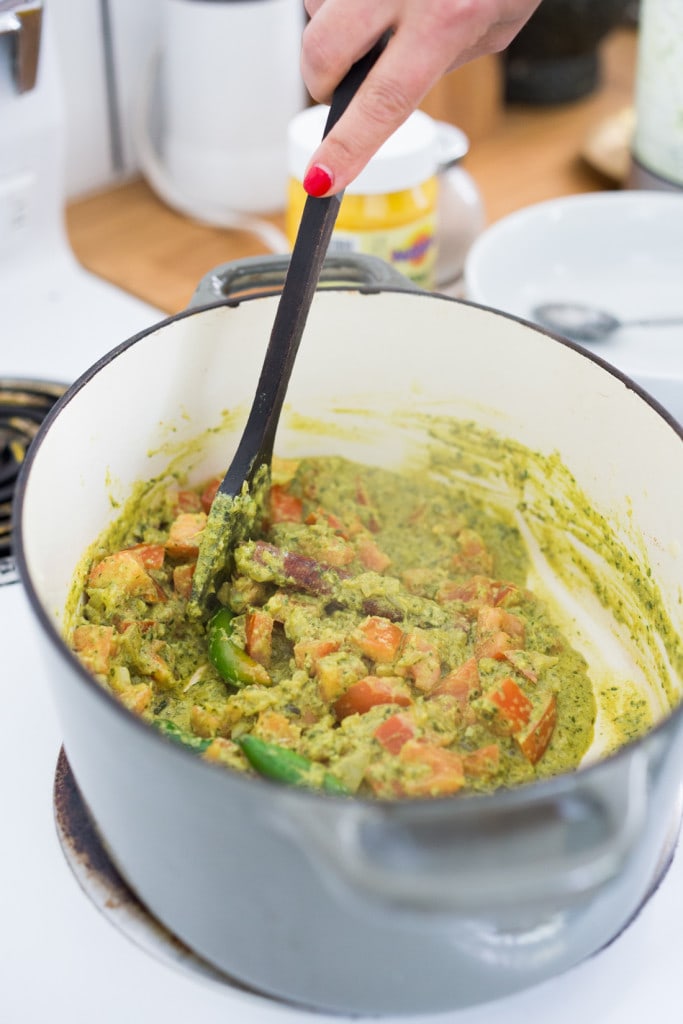 An authentic & insanely delicious recipe for Chicken Biryani with Cilantro Yogurt Sauce. Vegetarian option included as well as detailed step by step instructions. | www.feastingathome.com