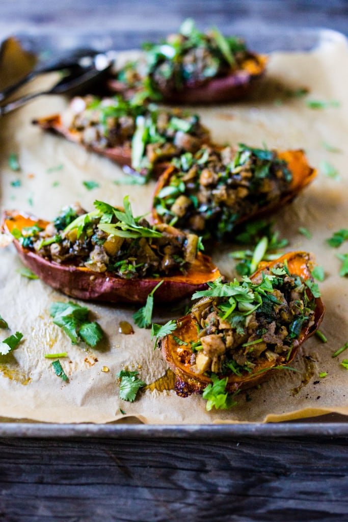 A recipe for Vegan Moroccan Sweet Potatoes w/ chickpeas, apples, onion, garlic & cilantro and flavorful Moroccan spices. 