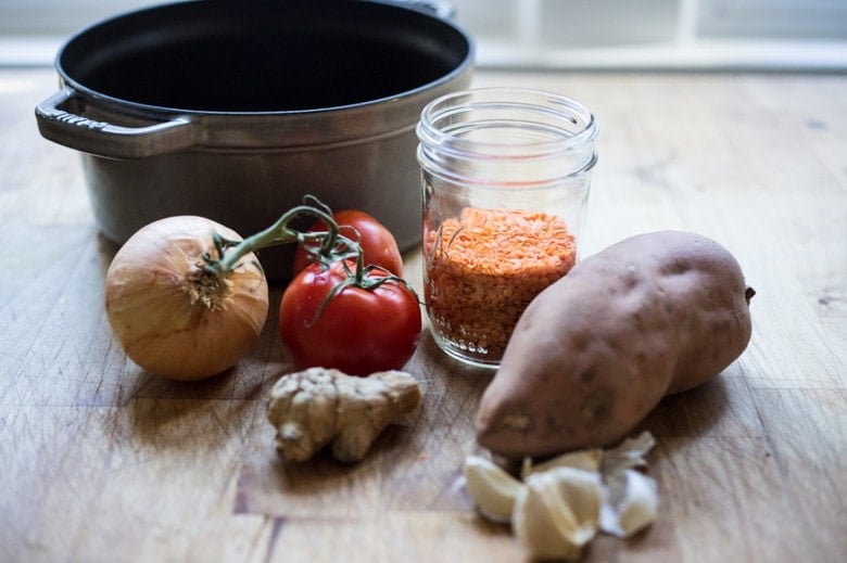 Soulful, Comforting Lentil Dal with Sweet Potatoes and a flavorful "tempering oil". A quick 30 minute meal that is simple to make and full of fragrant Indian spices. Vegetarian | www.feastingathome.com #lentils #dal #lentildal #sweetpotatoes #vegan #glutenfree