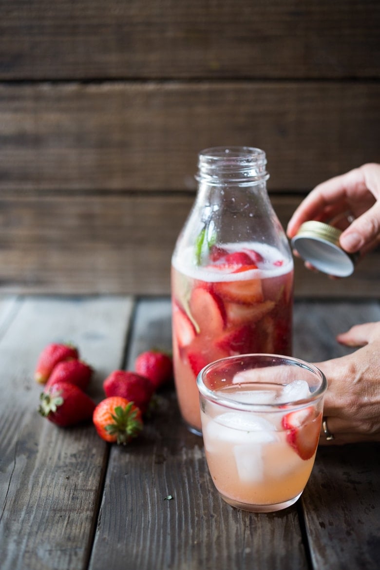 Strawberry Water Kefir, full of healthy probiotics, good for the gut, like Kombucha but BETTER and EASIER! A simple step by step guide | www.feastingathome.com