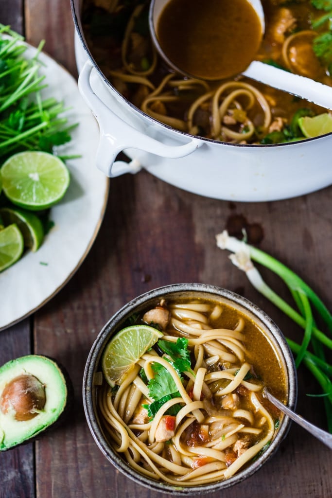 Flavorful, EASY Mexican Chicken Noodle Soup with cilantro, avocado and lime- a one pot meal, in under 30 minutes. Vegan option, sub chickpeas for the chicken!| www.feastingathome.com