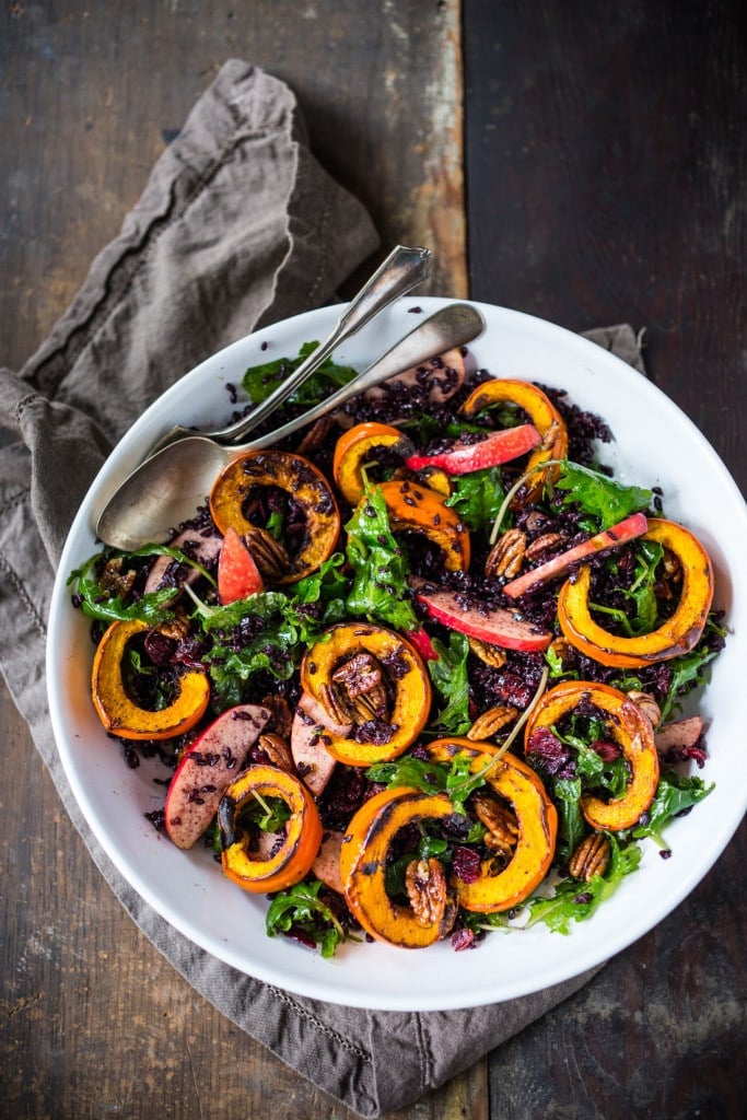 Maple-glazed Pecans, Dried Cranberries, and a vegan Maple Dressing.  #thanksgivingsalad #fallsalad #vegansalad #holidaysalad #pumpkin #wildricesalad #kalesalad #applesalad #thanksgiving #salad 