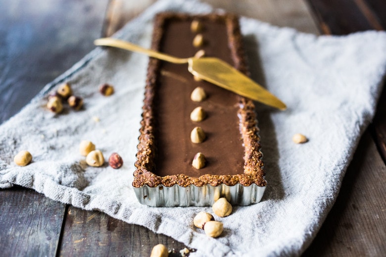 Chocolate Hazelnut Truffle Tart- a deceptively decadent recipe that is both vegan and gluten free. | www.feastingathome.com