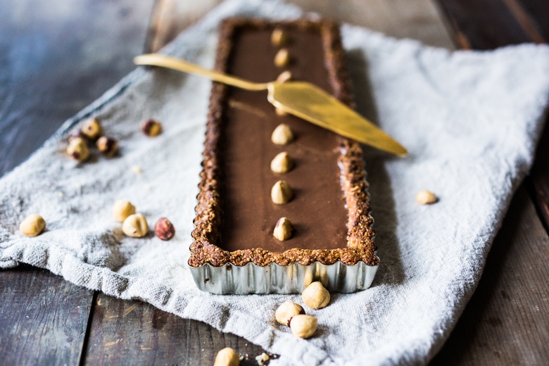 Chocolate Hazelnut Truffle Tart- a deceptively decadent recipe that is both vegan and gluten free. | www.feastingathome.com
