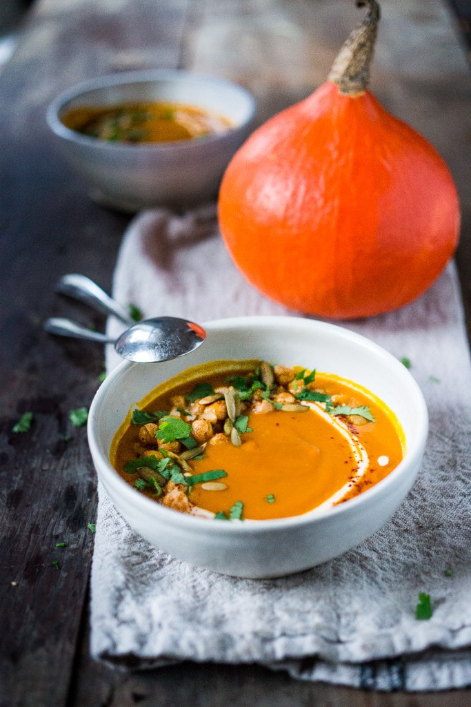 Roasted Kuri Squash Soup with Smokey Harissa, roasted chickpeas, toasted pumpkin seeds and "smoked" yogurt....a delicious vegetarian meal. | www.feastingathome.com