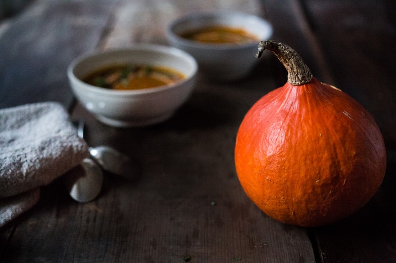 Roasted Kuri Squash Soup with Smokey Harissa, roasted chickpeas, toasted pumpkin seeds and "smoked" yogurt....a delicious vegetarian meal. | www.feastingathome.com