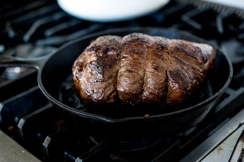 Rosemary Garlic Beef Roast with Wild Mushrooms , a simple elegant recipe perfect for your holiday dinner. | www.feastingathome.com