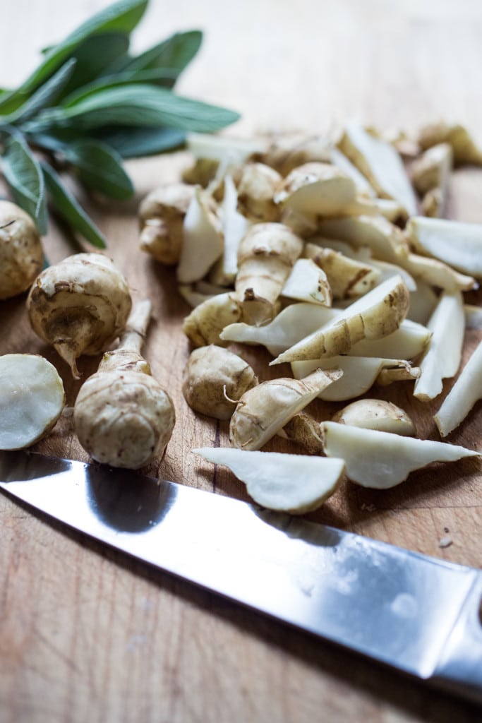 Vegan Mushroom Pasta with roasted sunchokes and a creamy vegan artichoke heart sauce ( use canned or frozen artichoke hearts) that can be made in under 30 minutes! Delicious, healthy, nut-free and totally vegan. #mushroompasta #veganpasta #roastedsunchokes #veganrecipes #plantbased #cleaneating #eatclean #vegan #sunchokerecipes #healthypastarecipes #artichoke #artichokesauce 