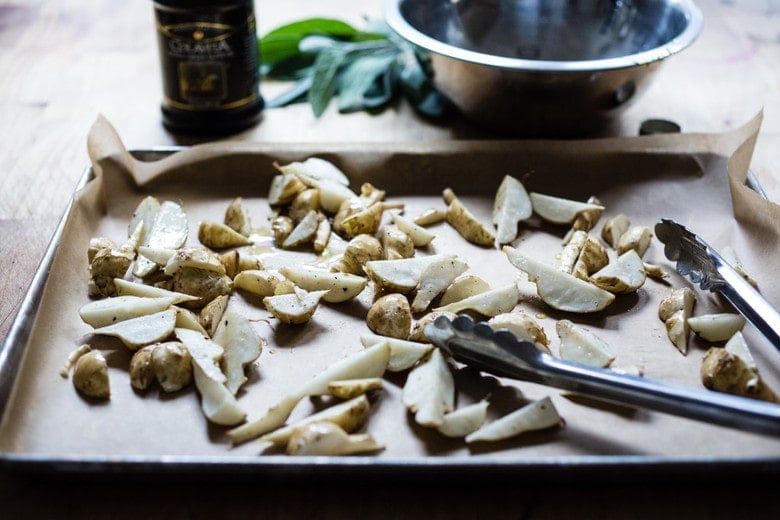 Vegan Mushroom Pasta with roasted sunchokes and a creamy vegan artichoke heart sauce ( use canned or frozen artichoke hearts) that can be made in under 30 minutes! Delicious, healthy, nut-free and totally vegan. #mushroompasta #veganpasta #roastedsunchokes #veganrecipes #plantbased #cleaneating #eatclean #vegan #sunchokerecipes #healthypastarecipes #artichoke #artichokesauce 