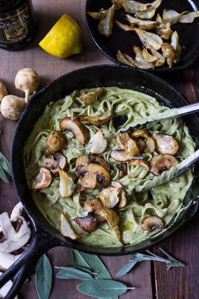 Vegan Mushroom Pasta with roasted sunchokes and a creamy vegan artichoke heart sauce ( use canned or frozen artichoke hearts) that can be made in under 30 minutes! Delicious, healthy, nut-free and totally vegan. #mushroompasta #veganpasta #roastedsunchokes #veganrecipes #plantbased #cleaneating #eatclean #vegan #sunchokerecipes #healthypastarecipes #artichoke #artichokesauce 