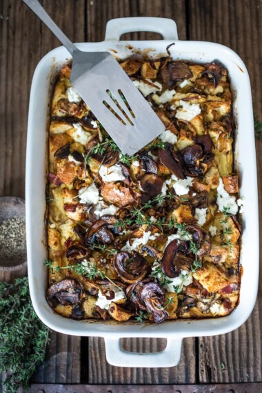 Breakfast Strata ( aka: egg casserole) with mushrooms, caramelized onion, goat cheese, and thyme.