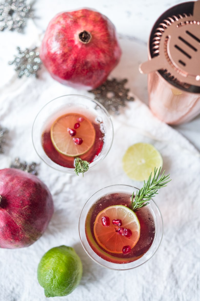 A simple recipe for a Pomegranate Drop with Rosemary ...a refreshing and festive holiday cocktail. | www.feastingathome.com