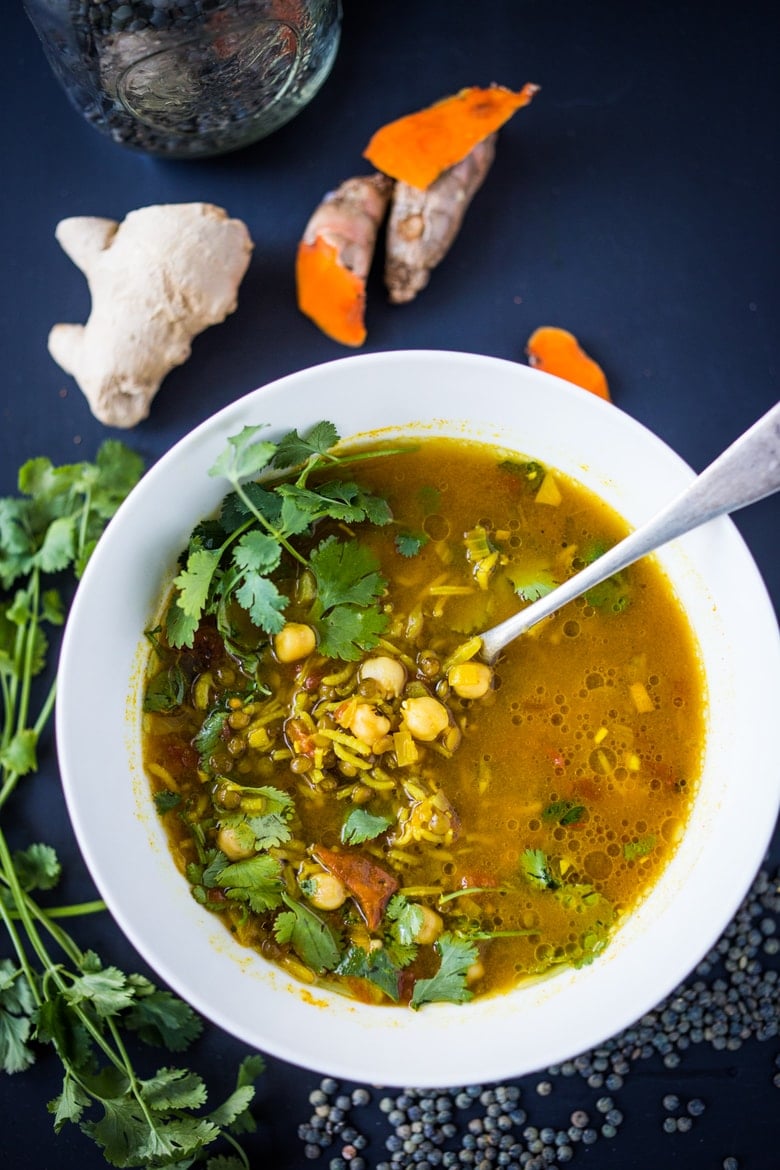 Turmeric Broth Detox Soup- A fragrant, healing broth with rice, lentils, kale, chickpeas and cilantro! | www.feastingathome.com