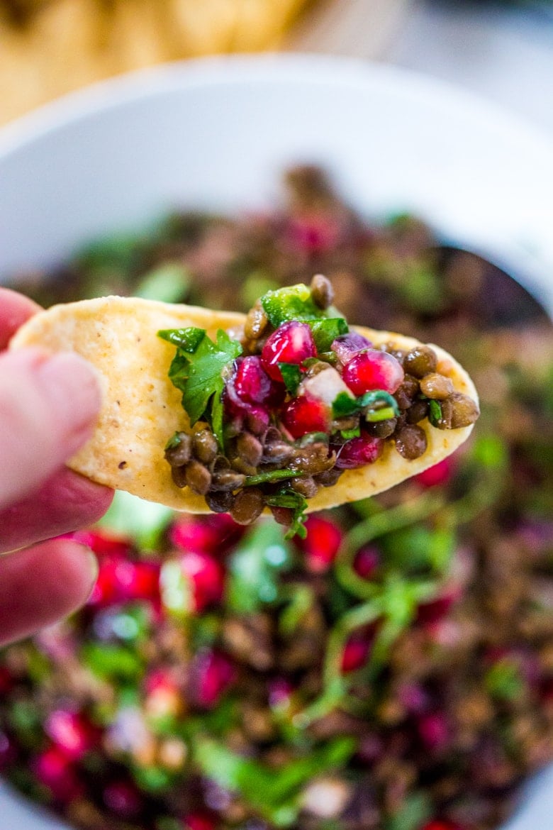 This lentil pomegranate salad is vibrant, flavorful, and packed with beets, herbs, and juicy pomegranate seeds. A healthy, protein-rich salad perfect for meal prep. Can also be served with tortilla chips for a festive appetizer dip. Vegan and Gluten-free.