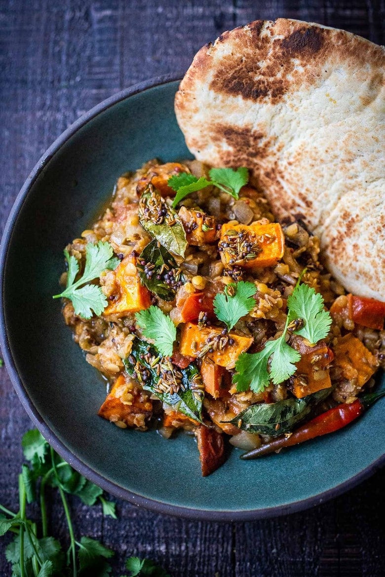 Sweet Potato Dal-a comforting Lentil Dal with Sweet Potatoes and a flavorful "tempering oil". A 30 minute vegetarian meal that is simple to make and full of fragrant Indian spices. Vegan adaptable! #lentils #dal #lentildal #sweetpotatodal #sweetpotatoes #vegan #glutenfree