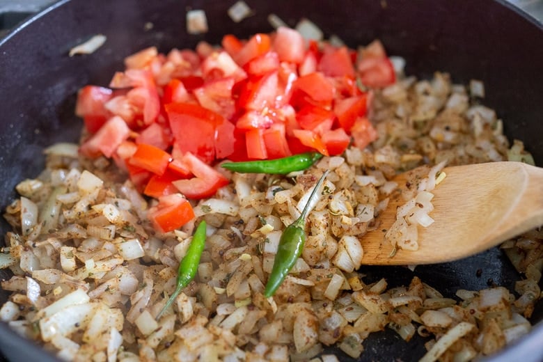 saute the onions garlic ginger and add the tomatoes 