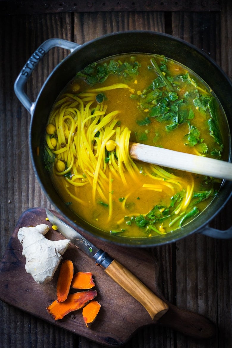 Turmeric Broth Detox Soup- A fragrant, healing broth with rice noodles, kale, chickpeas and cilantro! | www.feastingathome.com