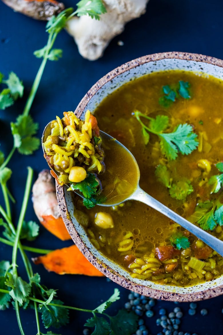 Turmeric Broth Detox Soup- A fragrant, healing broth with rice, lentils, kale, chickpeas and cilantro! | www.feastingathome.com