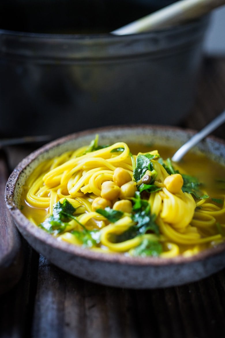Turmeric Broth Detox Soup- A fragrant, healing broth with rice noodles, kale, chickpeas and cilantro! | www.feastingathome.com