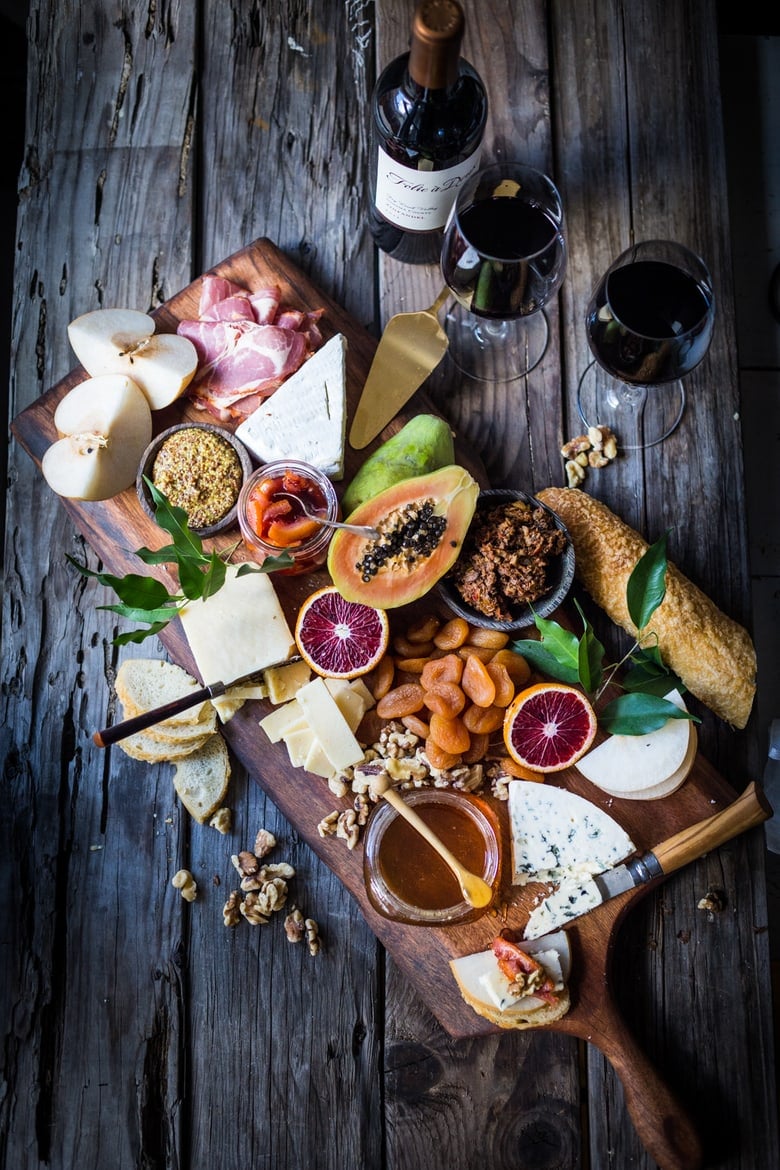 How to make a Winter Cheese Board with a good variety of cheeses, winter fruits, nuts, dried fruits, olives, and this delicious recipe for Blood Orange Marmalade. 