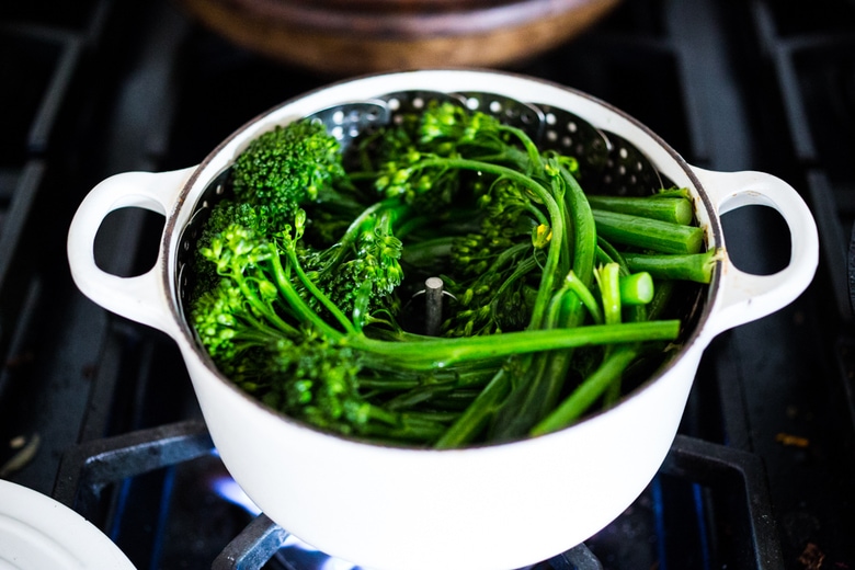 A Tasty recipe for Garlic Chili Tofu with Sesame Broccolini- a delicious and fast, 15 minute dinner that is vegan and gluten free. Healthy & Yummy! | www.feastingathome.com