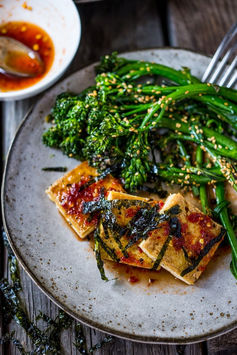 A Tasty recipe for Garlic Chili Tofu with Sesame Broccolini- a delicious and fast, 15 minute dinner that is vegan and gluten free. Healthy & Yummy! | www.feastingathome.com