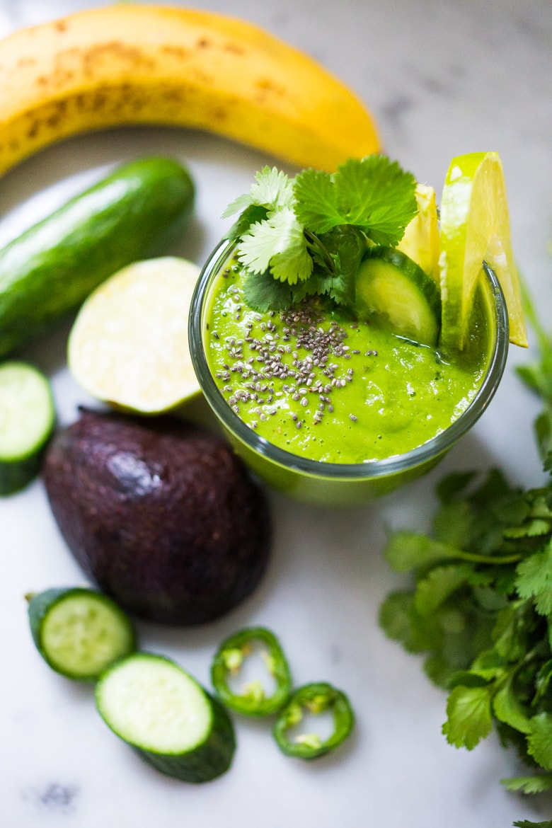 An energizing, spicy Mexican-style green smoothie with avocado, pineapple, cucumber, cilantro, jalapeño and lime! Refreshing, energizing and totally invigorating! Vegan! #vegan #detox #greensmoothie #greenjuice #vegangreensmoothie #avocadosmoothie #smoothie #eatclean #cleaneating #plantbased #vegansmoothie