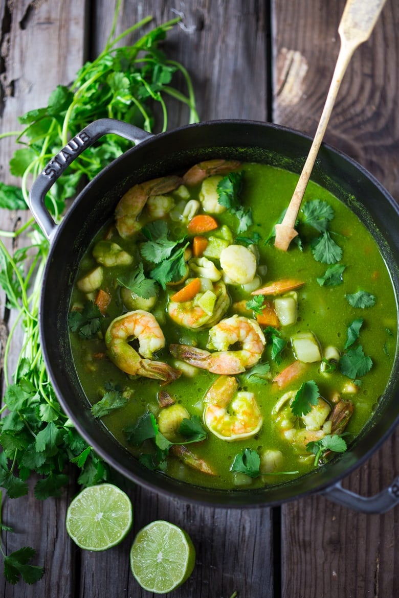 A delicious recipe for Peruvian Seafood Stew with Cilantro Broth, with potatoes and carrots. Healthy, Gluten free, Easy... and can be made in 35 minutes! | www.feastingathome.com