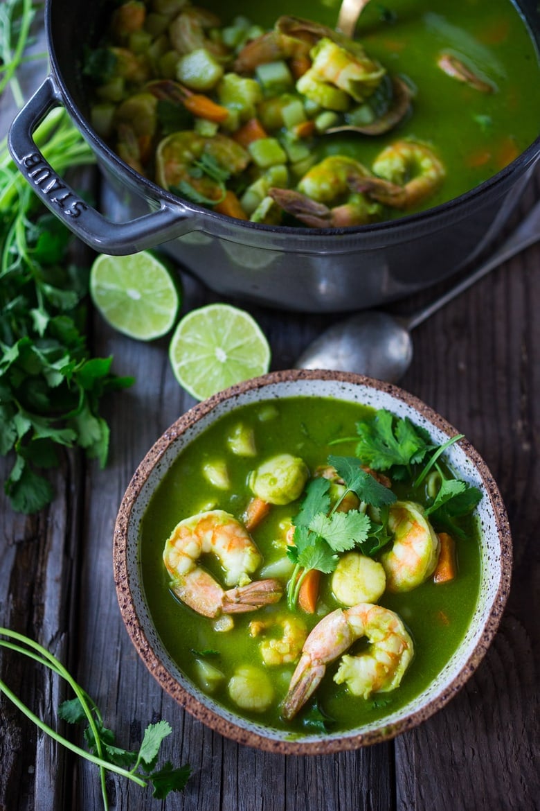 20 BEST FISH RECIPES | Peruvian Seafood Stew with Cilantro Broth- made with fish and shellfish, potatoes, carrots and the most flavorful delicious broth! Healthy, Paleo, Gluten free, Easy! Can be made in 35 minutes! | #seafoodstew #fishstew #seafoodsoup #peruvian #peruviansoup #peruvianfood www.feastingathome.com