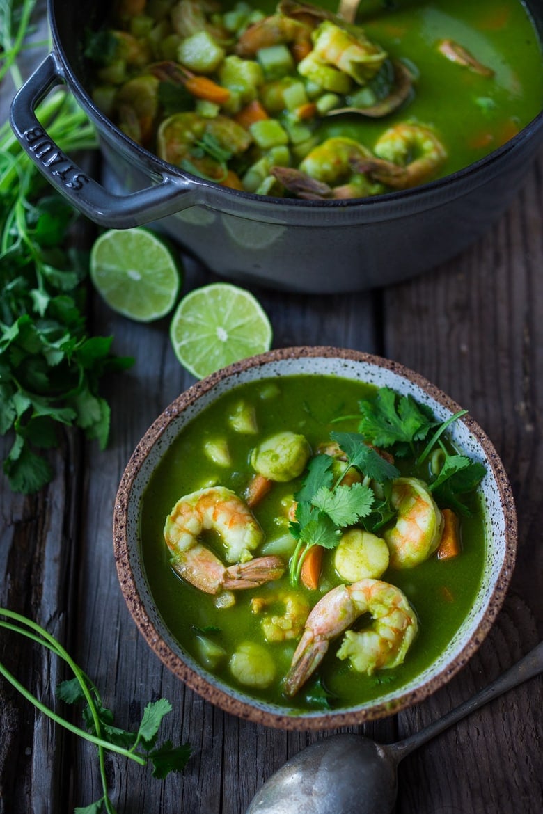 Peruvian Seafood Stew with Cilantro Broth- made with fish and shellfish, potatoes, carrots and the most flavorful delicious broth! Healthy, Paleo, Gluten free, Easy! Can be made in 35 minutes! | #seafoodstew #fishstew #seafoodsoup #peruvian #peruviansoup #peruvianfood www.feastingathome.com