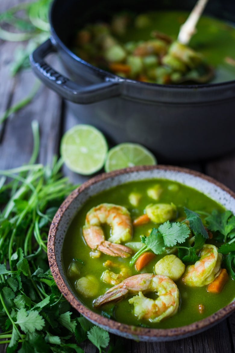 A delicious recipe for Peruvian Seafood Stew with Cilantro Broth, with potatoes and carrots. Healthy, Gluten-free, Easy... and can be made in 35 minutes! | www.feastingathome.com