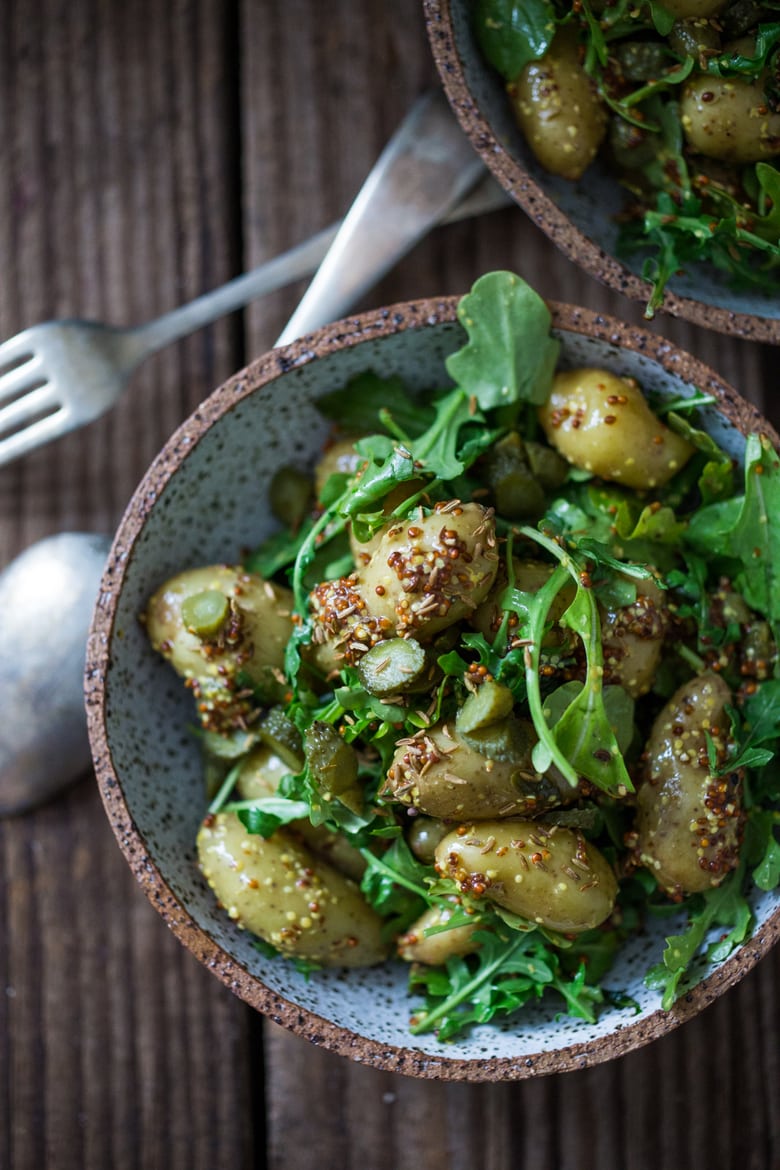 Vegan Potato Salad with Mustard Seed Vinaigrette (No Mayo!) A simple, healthy recipe, great for midweek lunches or make ahead for potlucks and gatherings. #veganpotatosalad #potatosaladrecipe #healthypotatosalad #nomayo #makeadheadsalad | www.feastingathome.com 