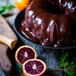 A delicious recipe for Dark Chocolate Bundt Cake with Blood Oranges and a Chocolate Ganache icing. Simple and scrumptious! | www.feastingathome.com