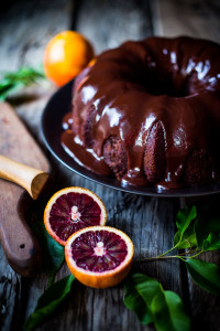 A delicious recipe for Dark Chocolate Bundt Cake with Blood Oranges and a Chocolate Ganache icing. Simple and scrumptious! | www.feastingathome.com