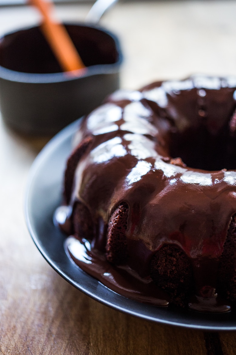 A delicious recipe for Dark Chocolate Bundt Cake with Blood Oranges and a Chocolate Ganache icing. Simple and scrumptious! | www.feastingathome.com