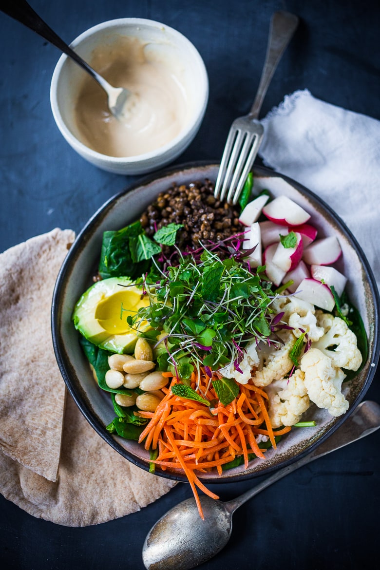 Minted Lentil Veggie Bowl - a healthy veggie bowl with lentils, seasonal veggies, almonds, avocado and a quick "hummus" dressing. Vegan and GF